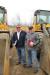 Walt Joachim Jr. (L) and Ron Gumbert, both of Penn Jersey Machinery, take time for a photo between two Volvo wheel loaders.