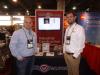 The Bidspotter booth featured timed online auctions and live webcast auctions. Tim Hill (L), vice president of sales, and Austin Lamm, sales manager.