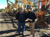 Matt (L) and Ed Vaukenburg, both of VMC Attachments in Greenwood, S.C., shop the selection of excavators from a variety of manufacturers, including Komatsu, Hitachi, Cat, Volvo and others.