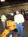 Dan Fischer, foreman of Mankato, Minn., street department, checks out a Carlton Ox stump grinder. 

