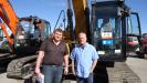 Travis Fox (L) and Larry Armstrong of Yancey Bros. give this Cat 315D a good look.
