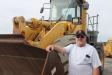 Larry Brusky, owner of Brusky Construction, Niles, Mich., is ready to inspect this Komatsu WA500 loader.  