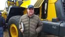 Randy Wright, owner of Wright’s Excavating in St. Cloud, Fla., takes a close look at this Komatsu WA380.