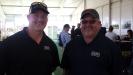 AJ Perisho, used equipment manager, and Jay Germann, general manager, Springfield, Ill., both of Roland Machinery Co., register for the auction.
