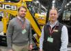 Kevin Ray (L) of Burns JCB and Jim Blower, regional business manager, JCB North America , attend the show.