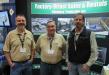(L-R): Jim Hamilton, Raul Felman and Al Baron, all of Efficiency Production, greet attendees at the MITA conference.