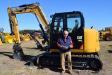 From Fairhope, Ala., Terry Barksdale of Alex Lyon & Son ensures this Caterpillar 308E excavator was listed correctly in the program and ready to sell. 