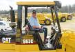 Alfred Post of Post Farms in Ohio admires a Caterpillar 963 C loader at the auction.