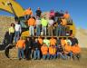 The Hiltz Excavating team — and a Cat 365CL hydraulic excavator.