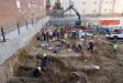 A construction crew discovered the graves as they were working on an apartment building (photo via AP News.)