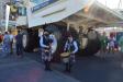 This mini pipe band performed for guests in front of this Terex Trucks TR60 rigid hauler. 
