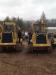 Gideon Stoltzfus (L) and Aaron Hoover, A&A Enterprises, Denver, Pa., discuss auction strategy on these two Cat dozers.