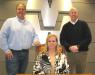 (L-R): JM Wood Auction owners Bryant, Kim and Russ Wood in their new conference room.