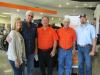 (L-R): Regina and James Raymond, owners of Raymond Construction, talk with Bart Young, GM of Ditch Witch of Texas; Paul Knuckley, owner of Ditch Witch of East Texas; and J.B. Raymond. The Raymonds are long-time Ditch Witch owner