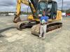 Scott Tulloss of Tulloss Equipment in Rocky Mount, N.C., shops the selection of excavators.