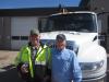 Rich Newman (L), retiree of Musson Brothers Inc., enjoys the open house with Dean Adsit, used equipment sales, Nortrax.