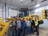 (L-R):?Ryan, Pat, Dan and Pete Barnett, all of Barnett Bros. Inc., an excavating company in southern Minnesota, talk with Dan Rynda, Road Machinery & Supplies, and Jeff Bistadeau, sales, Road Machinery & Supplies, Savage, Minn.    