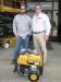 Brian Cornelison (L) of Jackson Energy Authority held the winning ticket for a Cat RP3600 generator, and received the prize from Del Reid, CAT Rental Store territory sales.