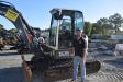 Matt Mortellaro of Moyer Trucks & Equipment, Seffner, Fla., tries out this Terex TC75 excavator before bidding started.