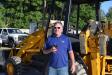 Glen Stocker of American Diesel & Hydraulics, Dunnellon, Fla., shows interest in this JCB backhoe at the auction.