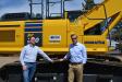 Randy Agee (L), general manager of product support, and Grant Adams, president, show off one of the Komatsu PC 360s in their ever-growing inventory.