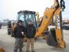 Curt (L) and Blake Decker of Decker Fire Protection have a look at this late-model Case 580 Super N loader backhoe.