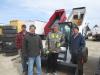 (L-R): Adam Heinson, Jelly Stone Park; Jeff Knepper, Five Star Services Inc.; Steve Bigelow, Elite Electrical Co.; and Tom Mateljan, Five Star Services Inc., look over the skid steers at the April 29 auciton. 
