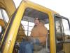 Ricky Sarazin of Sarazin Logging sits at the controls of this John Deere 190 excavator.