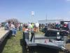 A group of bidders gather to bid on trailers during the April 13 auction in Ottumwa, Iowa.