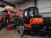 Paul Kroening, regional sales manager, Kubota Tractor Corporation, Fort Worth, Texas, goes over the features of this Kubota KX057-4 excavator.