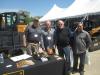 (L-R): Rich Windbiel, Rockland Manufacturing, and Ray Sullivan, McCann Industries Inc., go over the Rockland Manufacturing buckets and dozer blades with Mike Thompson and Dominic Fiordirosa, both of Archon Construction Co. Inc.