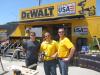 (L-R): Greg Voirin of MSL Inc. stops by the DeWALT booth to check out a demonstration by Peter Gerosa and Dan Gilligan, both of DeWALT.