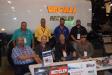(L-R, front):  John Roserberry, Lanny Hollifield, Steve Tuton, David Moore, and (L-R, back) Robert Martin, Tod Ebetiwo, Jared Wilson and Mike Knowles represent Great Southern Equipment Company at the expo.