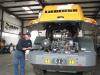 Frankie Raney, HMI service tech, performs diagnostic work on a Liebherr 528 wheel loader in the shop area.