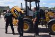 These sheriff deputies get an up-close look at this Cat 908M wheel loader.