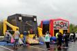 The dreary day didn’t stop the children from enjoying the thrill of the bounce houses.