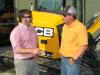 Chris Shea (L), Low Country JCB, and Mathew Woodrum of Mill Creek Construction, Statesboro, Ga., talk about the local construction industry.