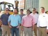 (L-R): Tony Davis, Clint Holcombe, Jonathan Moore, Chris Shea, Matt Morris and Scott George, all of Low Country JCB, help attendees at the event.
