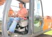 Derrick Triplett of Triplett Trucking & Excavation, Gulfport, Miss., test operates a Hitachi Zaxis 200LC excavator.