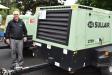 Bill Taromino, area sales manager of Sullair, spoke with customers about his company’s 375H portable air compressor.