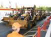 The Ritchie Bros. staff made quick work of auctioning the backhoe loaders before the heavy iron rolled across the ramp.