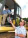 Peyton (L) and his dad, Adam Stanfield of AL Grading & Excavating, Montgomery, Ala., get a closer look at this Komatsu PC300HD.