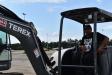 Uriah Chitolie, owner of Chitolie Trucking in St. Croix, U.S. Virgin Islands, tries out this Terex mini-excavator.