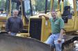 Rob Lodge (L), owner of Lodge Earthworks LLC, Windsor, Conn., and Richard Roulston, owner of Roulston Services LLC, Windsor Locks, Conn., examine this dozer.