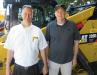 Art Westfall (L), Ohio CAT, and Mike Lane, Ohio CAT’s The Rental Store, greet attendees and discuss their line of Caterpillar equipment.
