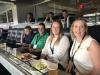 (L-R): Zach Benevento and David Mattiace of Unicorn Construction watching the game with Erica Galligan and Donna Galligan of Patriot Recycling, Oceanside, N.Y.