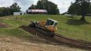 Travis Beisler puts the finishing touches on Unadilla Speedway just before its nationally sanctioned motocross race event.