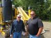 Dave Overholt (L) and Jeremy Livengood, both of Stark Excavating, inspect this Gomaco GT3600.
