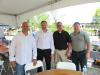 (L-R): Peter Colangelo, vice president of operations, Ozinga; Peter Mayr, managing director, Liebherr USA Co.; Jerry Joynt, Finkbiner Equipment Company; and Ed Jongsma, fleet coordinator, Ozinga, enjoy the barbeque lunch at the open house. 
