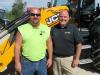 Jay Holtz (L) of Holtz Electric, who recently purchased JCB’s new Teleskid, catches up with Company’s Wrench’s Cam Gabbard at the rodeo.
